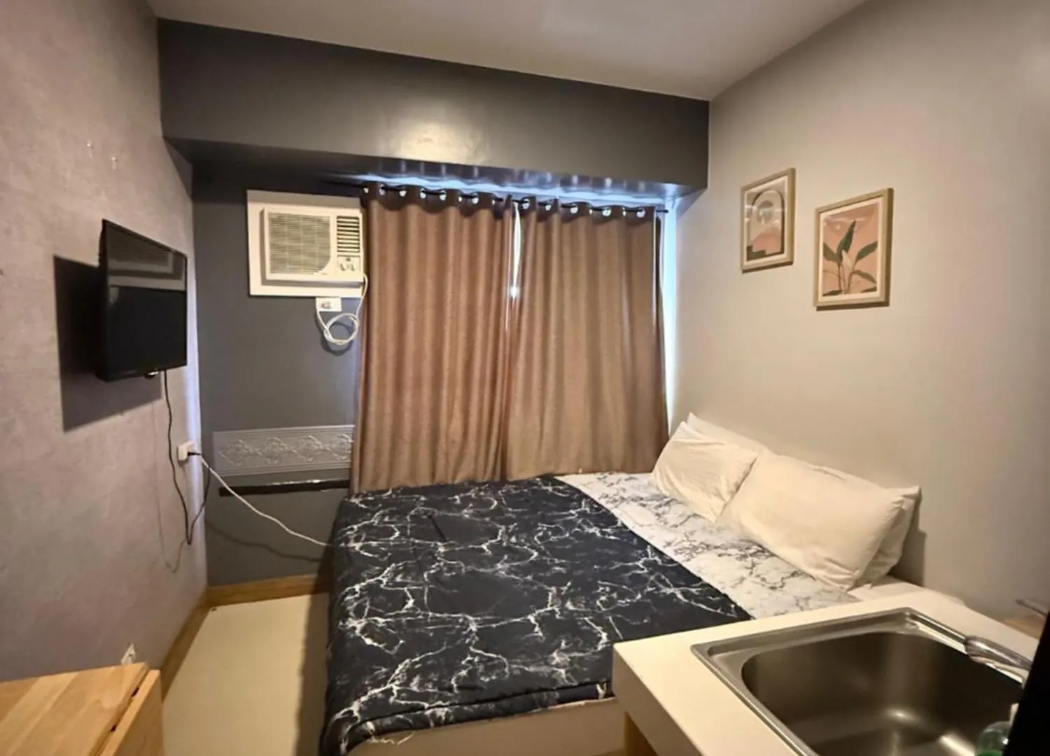Tranquility Urban Condo マンダルヨン・シティ アパートホテル